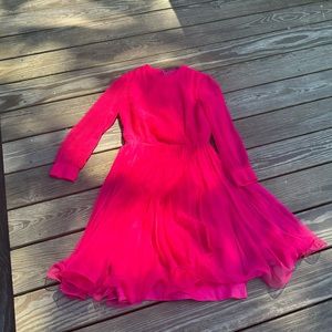 Large pink ruffle knife pleat dress